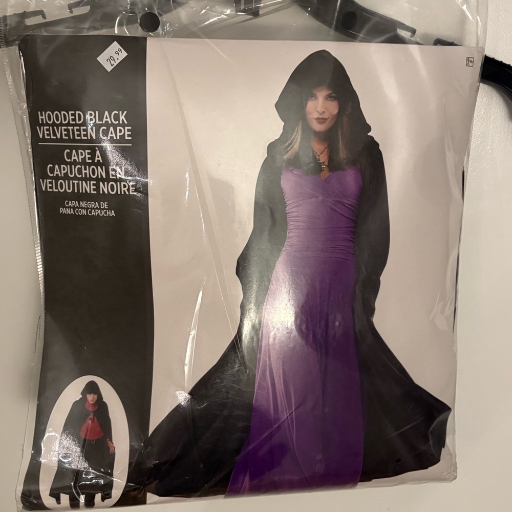 Women’s black velveteen hooded cape- One size fits most. Never worn